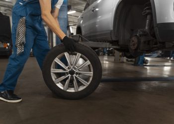 mechanic-working-shop-car